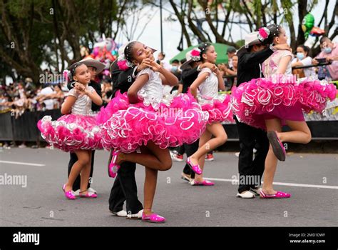 Folk dancers parade during the International Tournament of Joropo, in ...