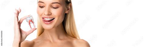 Panoramic Shot Of Naked Woman With White Teeth Holding Tooth Model Isolated On White Stock Photo