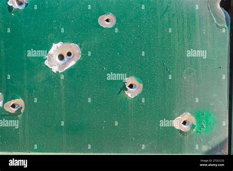 Bullet Holes In The Metal Multiple Bullet Marks On The Car Body