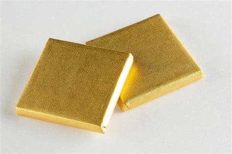 Premium Photo Chocolates Wrapped In Gold Foil