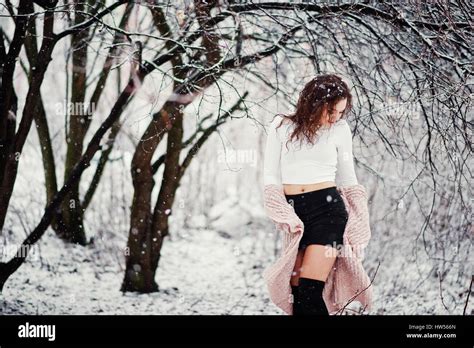 Curly Brunette Girl Background Falling Snow Wear On Warm Knitted Sweater Black Mini Skirt And