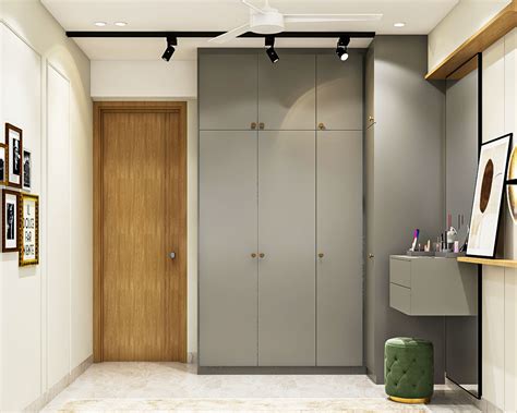 4 Door Grey Swing Wardrobe Design With Loft Storage Livspace