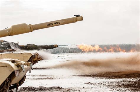 A Round Is Fired From An M1A2 Main Battle Tank Belonging NARA DVIDS