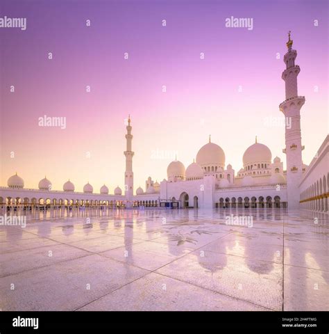 Sheikh Zayed Grand Mosque In Abu Dhabi During Pink Sunset View Of