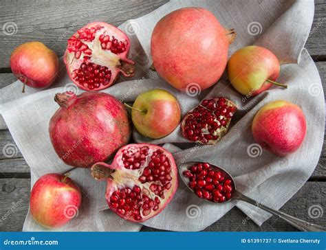 Still Life Of Autumn Fruits Pomegranates Grapes Apples Stock Image