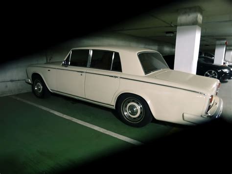 Photography Of Vintage Car Parked On A Parking Lot · Free Stock Photo