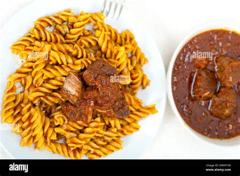 Fusilli Pasta With Neapolitan Style Ragu Meat Sauce Stock Photo Alamy