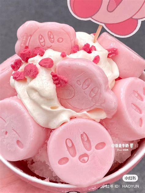 A Cup Filled With Ice Cream And Lots Of Pink Candies