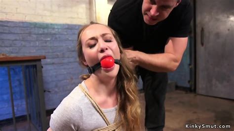 Brunette Gagged And Crotch Roped