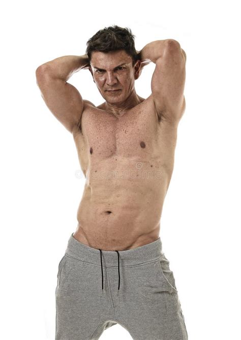 S Hispanic Sport Man And Bodybuilder Posing With Naked Torso Showing Fit Muscular Body Stock