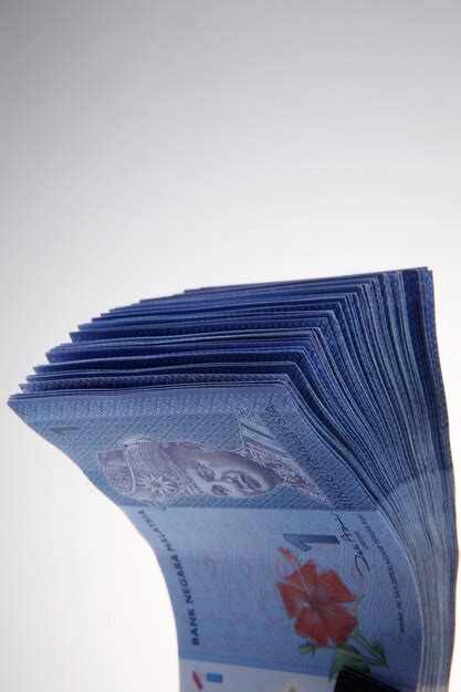 Premium Photo Close Up Of Paper Currency Against White Background