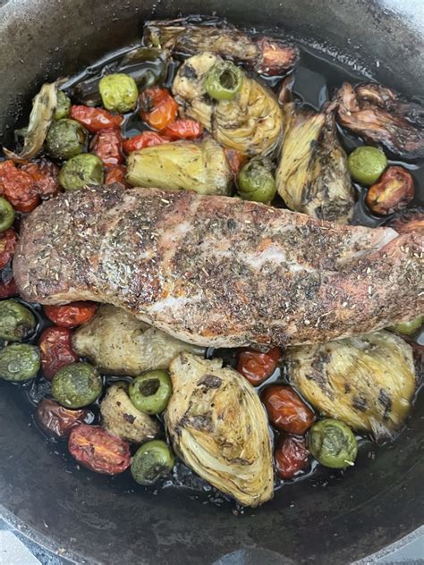 Pork Tenderloin With Olives Artichokes And Cherry Tomatoes Hill