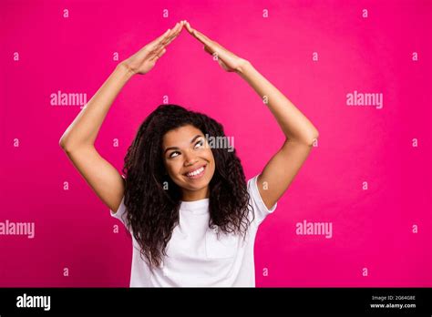 Photo Of Cute Brunette Millennial Lady Look Hands Roof Wear White T Shirt Isolated On Vivid Pink