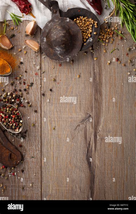 Various Herbs And Spices On Dark Wood Table Stock Photo Alamy