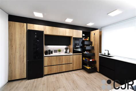 Cocina negra mate y madera moderna abierta al salón CJR Cocinas CJR