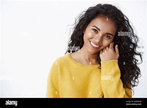 Close Up Attractive Curly Haired African American Woman Feeling Happy