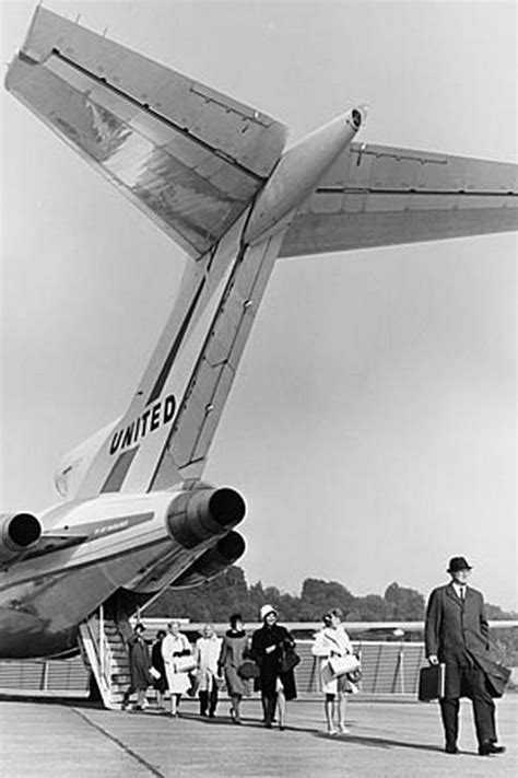 Deplaning From The Aft Stairs On A United Boeing 727 Before