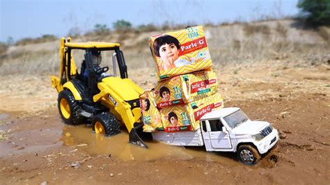 Bolero Pickup Stuck In Mud Pulling Out Jcb Dx Parle G Loading