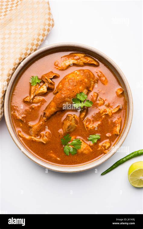 Indian Spicy Chicken Curry Or Masala Chicken With Prominent Leg Piece