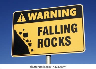 Falling Rocks Sign Photos, Images & Pictures | Shutterstock