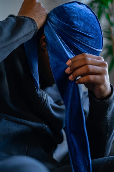 man wearing scarf      man wearing scarf