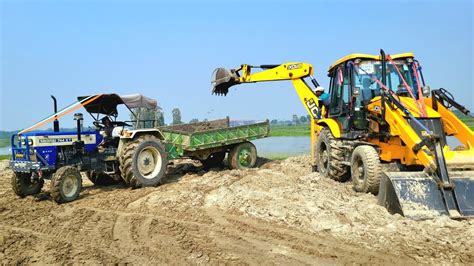 Jcb Eco Backhoe Fully Loading Mud In Swaraj Fe And Eicher