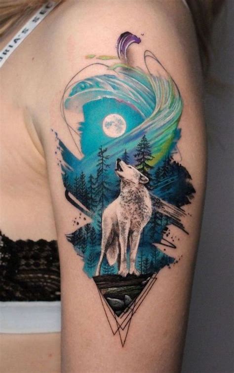 A Woman S Arm With A Wolf Tattoo On It And The Moon In The Background