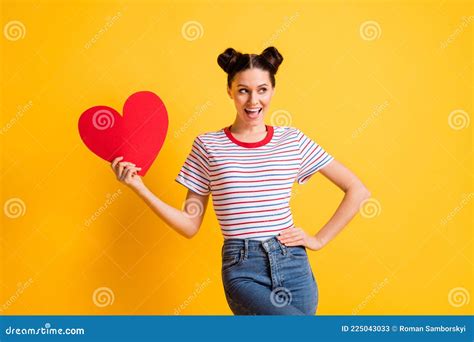 Photo Of Optimistic Brunette Lady Hold Heart Look Empty Space Wear T