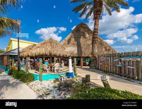 Thatched Roof Tropical Stump Pass Grill And Tiki Bar On Lemon Bay On The