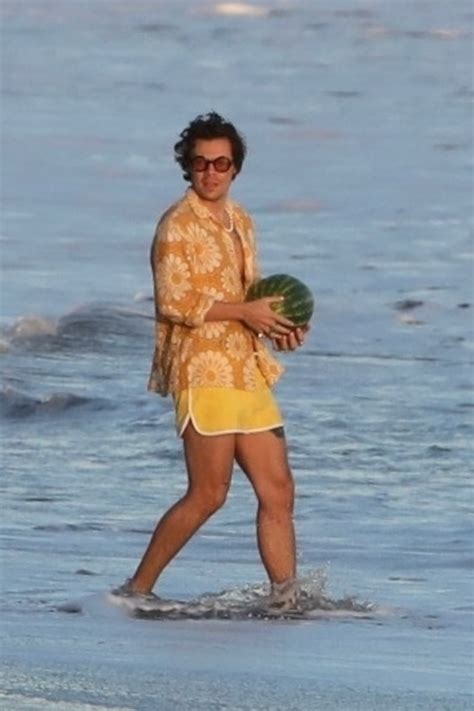 Harry Styles Surrounded By Bikini Clad Beachgoers Filming Music Video