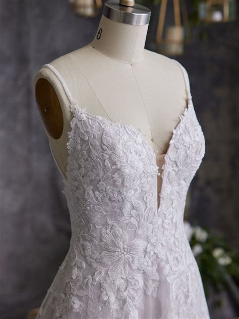 A White Wedding Dress On A Mannequin