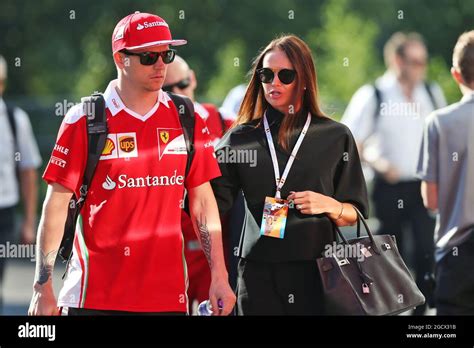 Kimi Raikkonen (FIN) Ferrari with his wife Minttu Raikkonen (FIN ...