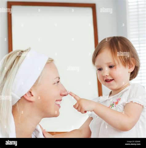 Beautiful Mother Taking Care Of Her Child Stock Photo Alamy
