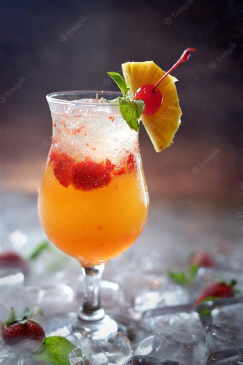 Premium Photo A Glass Of Strawberry Cocktail With A Pineapple On The Top