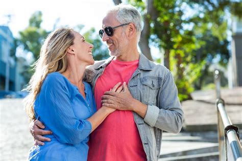 Premium Photo Romantic Mature Couple Standing In City