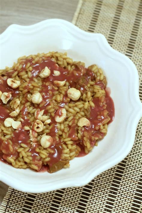 Risotto Ai Funghi Porcini Con Nocciole Tostate E Riduzione Al Nebbiolo