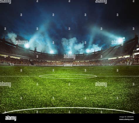 Football stadium with the stands full of fans waiting for the night game Stock Photo - Alamy