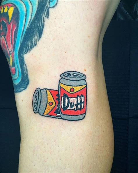 Hand Poked Duff Beer Tattoo Located On The Shin