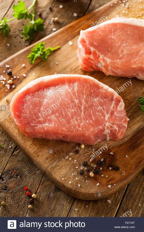 Raw Organic Boneless Pork Chops Ready To Cook Stock Photo Alamy