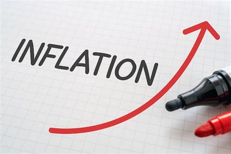 Premium Photo White Paper Written Inflation With Markers