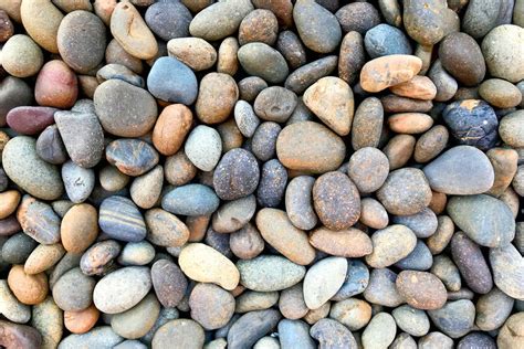 2023 River Rock Prices | Landscaping Stone Costs (Per Ton & Yard)