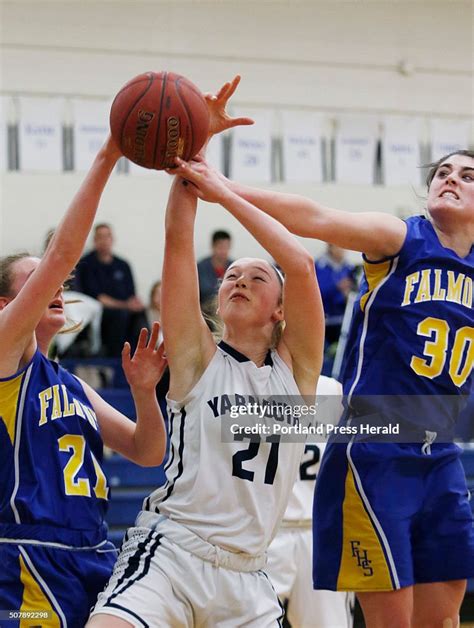 Yarmouth High Schools Alison Clark Left Center Battles Falmouth