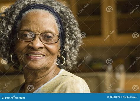 Portrait Of An Elderly African American Woman At Home Stock Image