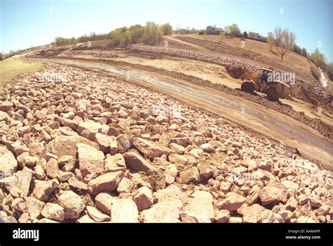 Wheel loader at construction site Stock Photo - Alamy