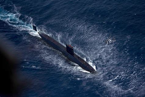 Royal Navy Trafalgar-class submarine HMS Trenchant (S91) and Royal Navy ...