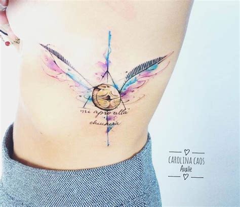 Golden Snitch Tattoo By Carolina Caosavalle Post 20565 Snitch Tattoo Harry Tattoos Harry