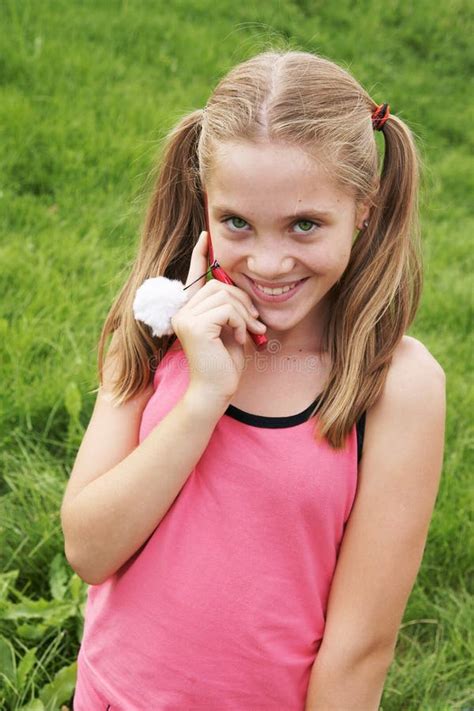 Kid Girl Putting On Shoes On Swing Stock Photo Image Of Cute Grass