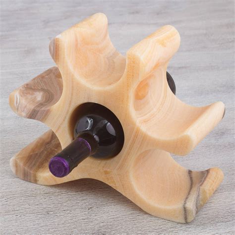 Carefully Carved From Onyx This Unique Wine Bottle Holder Reveals The