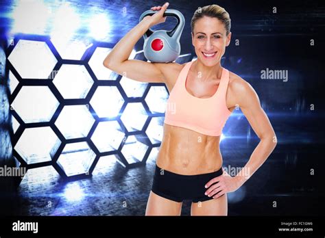 Composite Image Of Female Blonde Crossfitter Holding Kettlebell Smiling