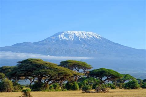 Landscape Of The Snowy Peak Of Mount Kilimanjaro Covered With Clouds